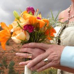 A women holds a bouquet of flowers at a Sedona wedding.