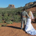 A bride and groom enjoying the view at wedding venue back o beyond