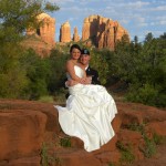 bride and groom in the shadow of Cathedral Rock Sedona