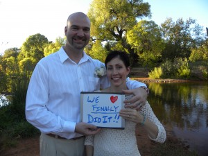 fall wedding couple and sign