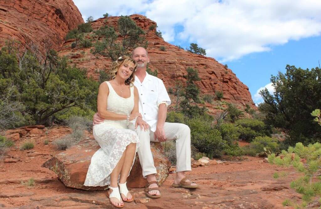 couple sitting at the Sugar Loaf wedding venue